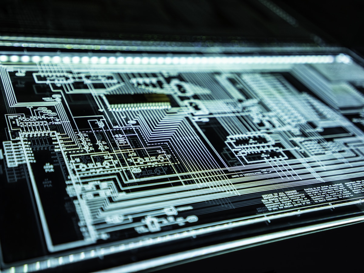 Advanced circuit schematic on a illuminated engineering workstation